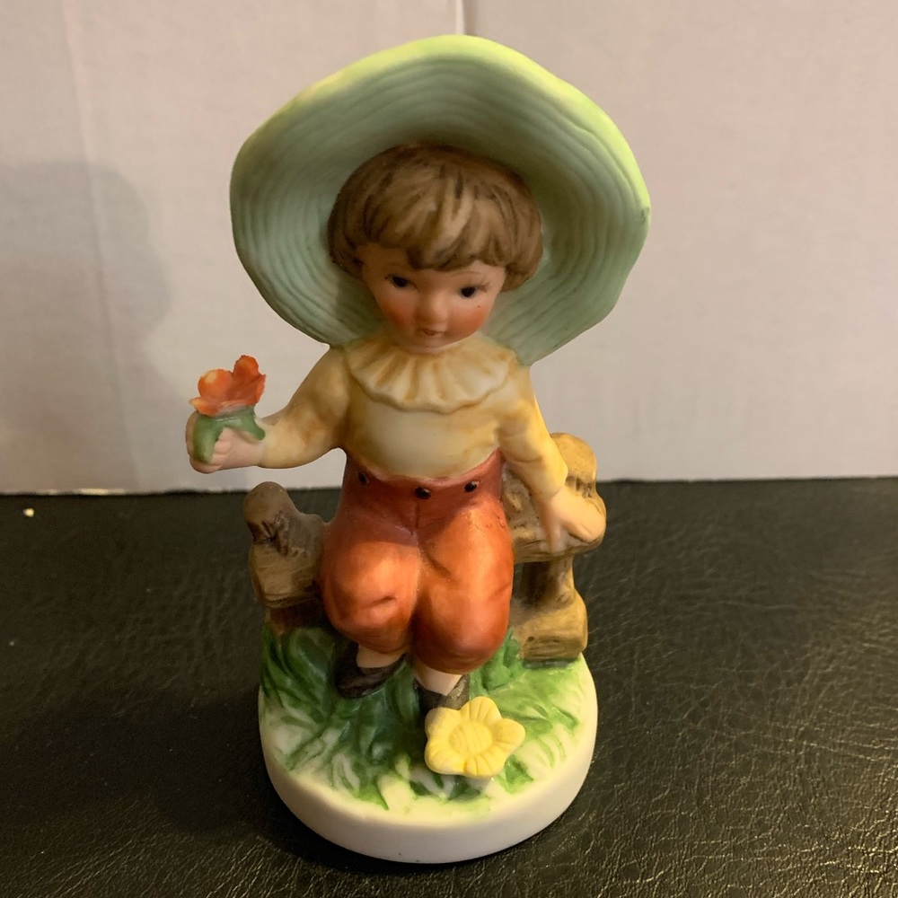 Adorable little boy figurine